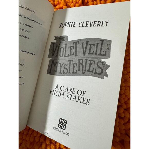 A Case of Grave Danger (The Violet Veil Mysteries) Paperback – October 5, 2021 - Picture 4 of 7